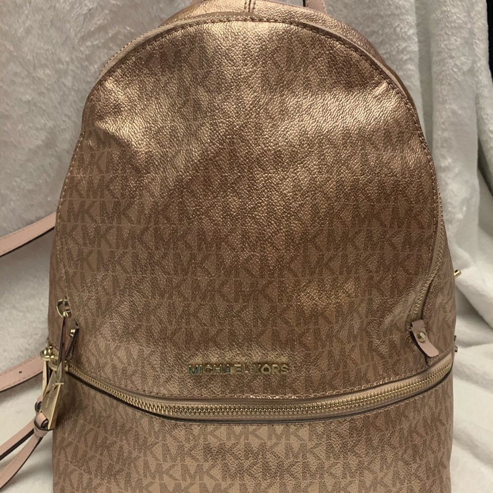 Michael Kors rose gold backpack purse